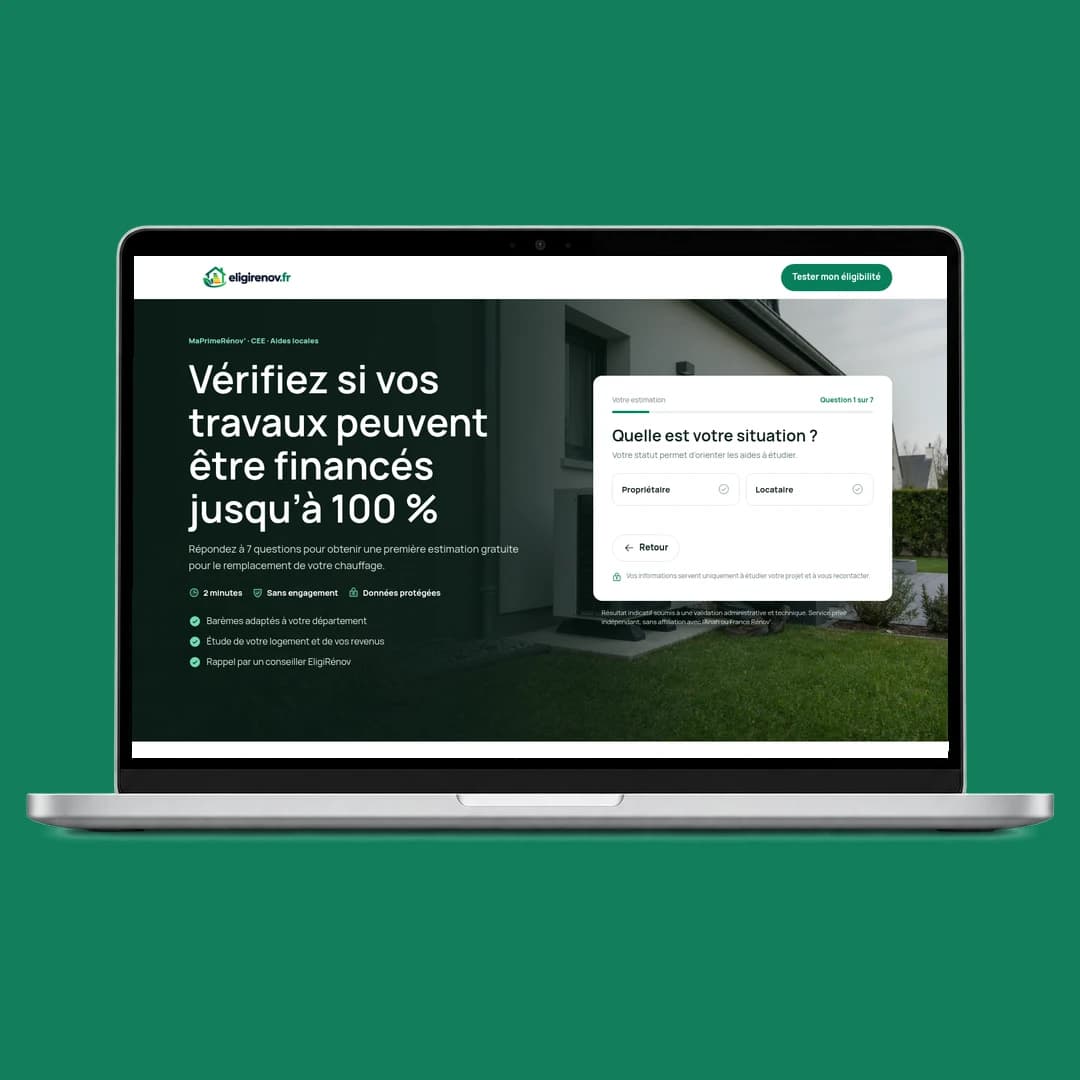 EligiRenov homepage displayed in a laptop mockup.