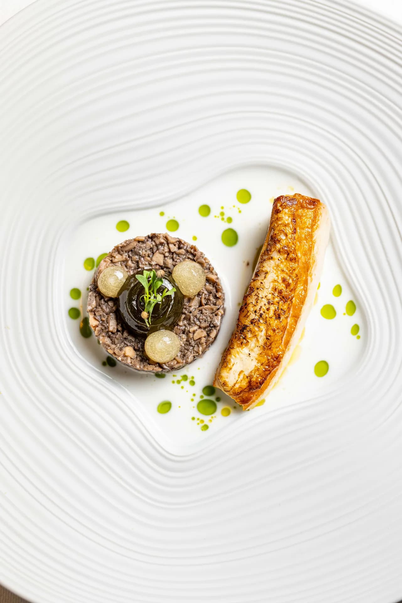 Uma tartare and fish course.