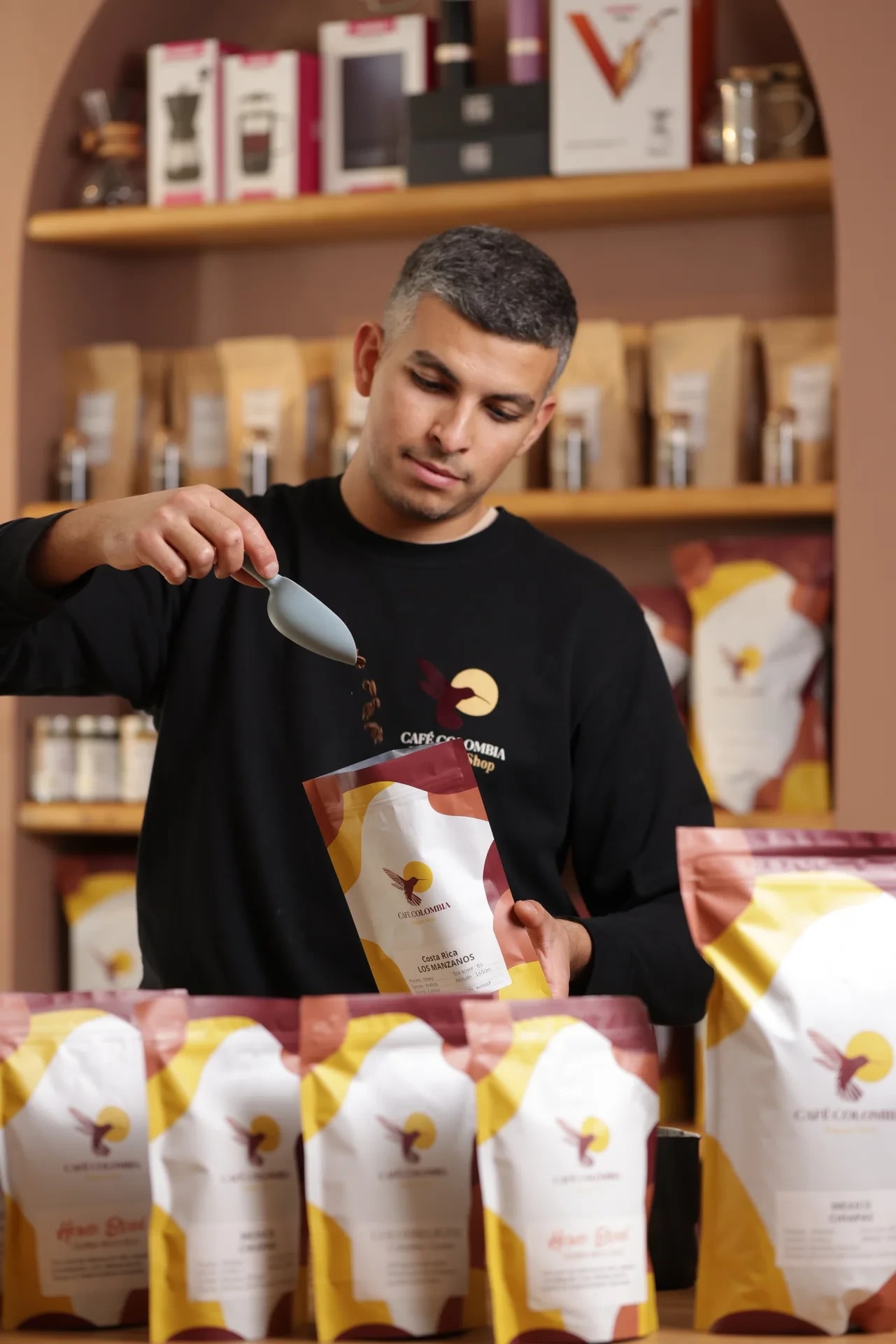 Café Colombia team and packaging.