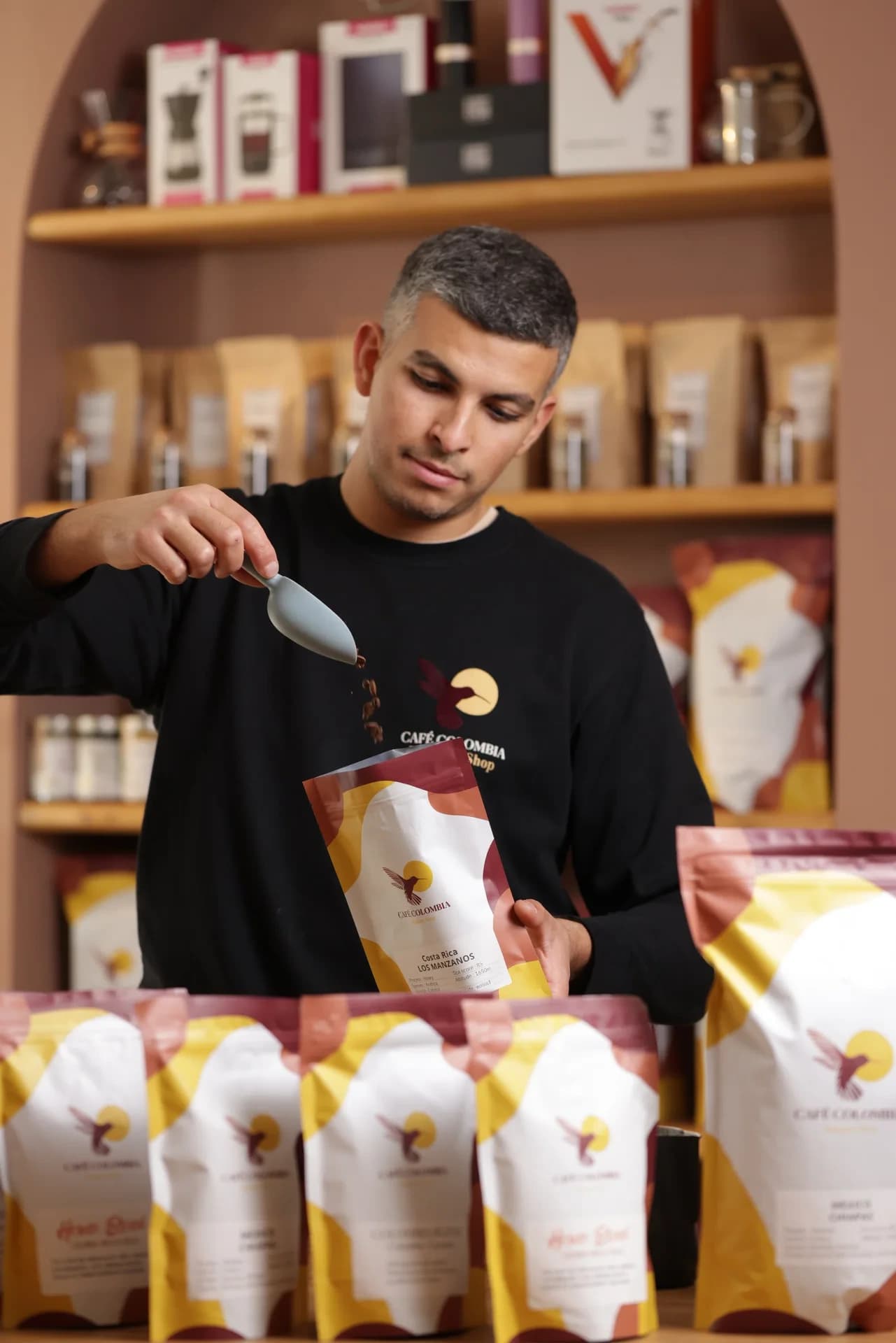 Café Colombia team and packaging.