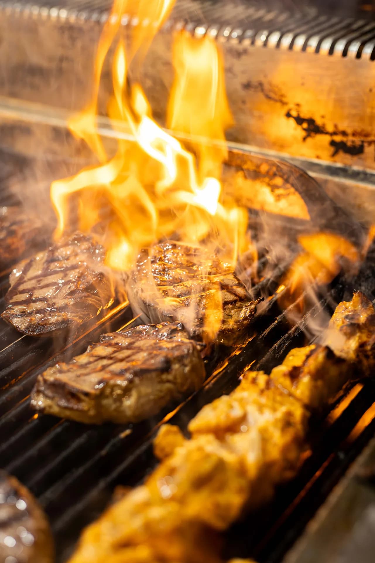 Steak ’n Chill steak on flame grill.